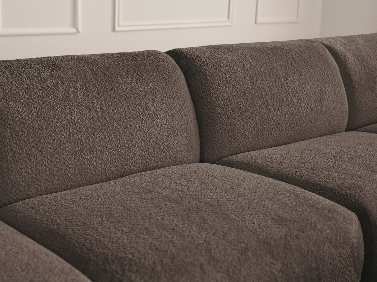 Canapé d'angle fixe modulable ANDA tissu chenille avec pouf