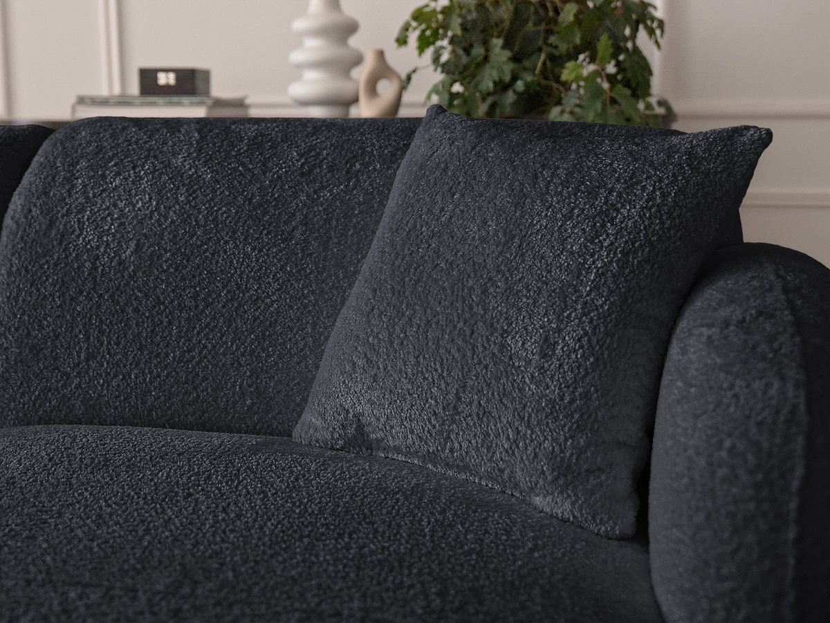 ANDA modulaire hoekbank met vaste zitting, bekleed met chenillestof en inclusief voetenbank.