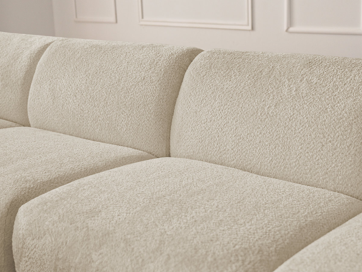 Canapé d'angle fixe modulable ANDA tissu chenille avec pouf