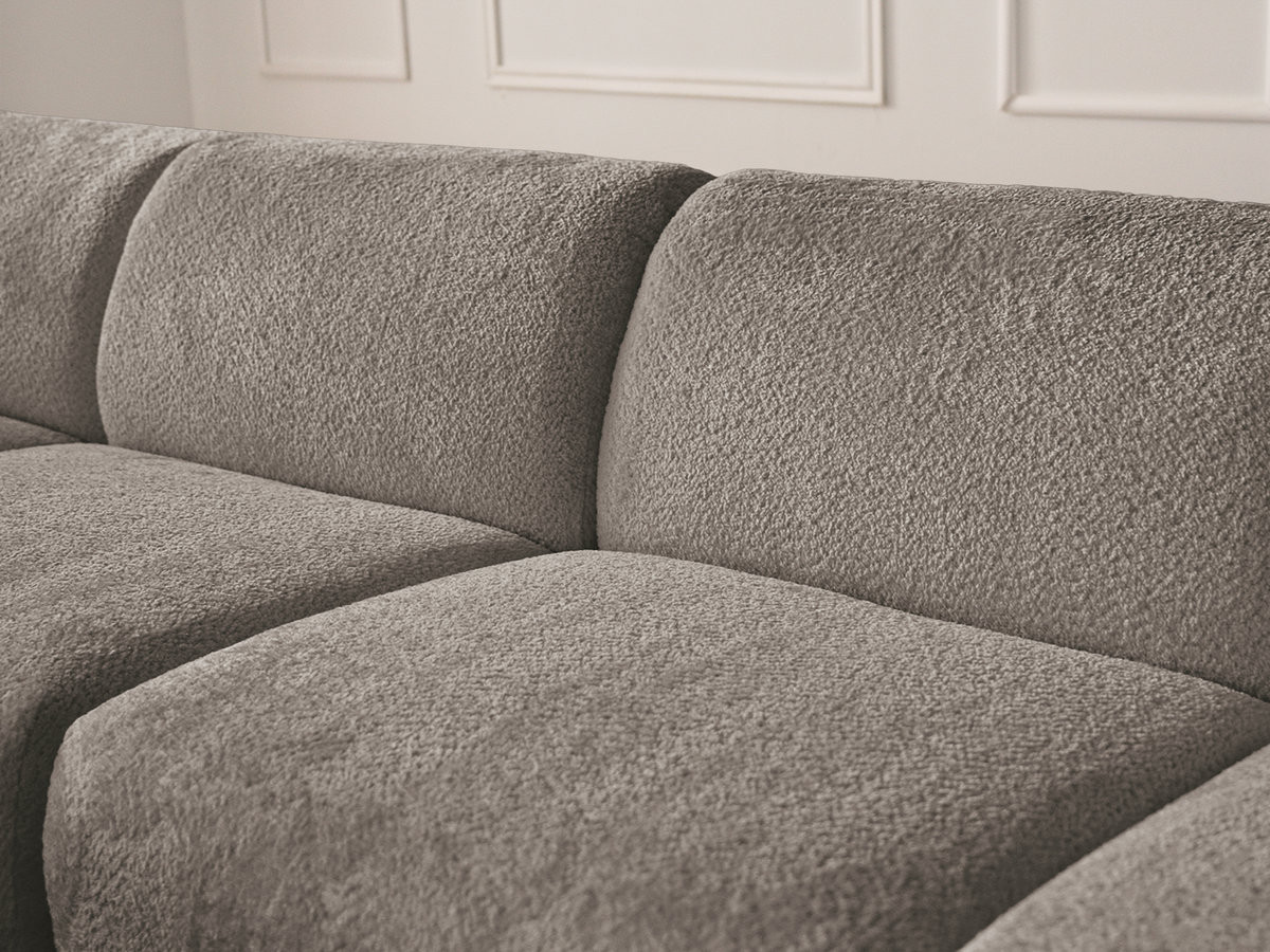 Canapé d'angle fixe modulable ANDA tissu chenille avec pouf