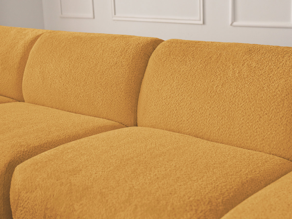 Canapé d'angle fixe modulable ANDA tissu chenille avec pouf