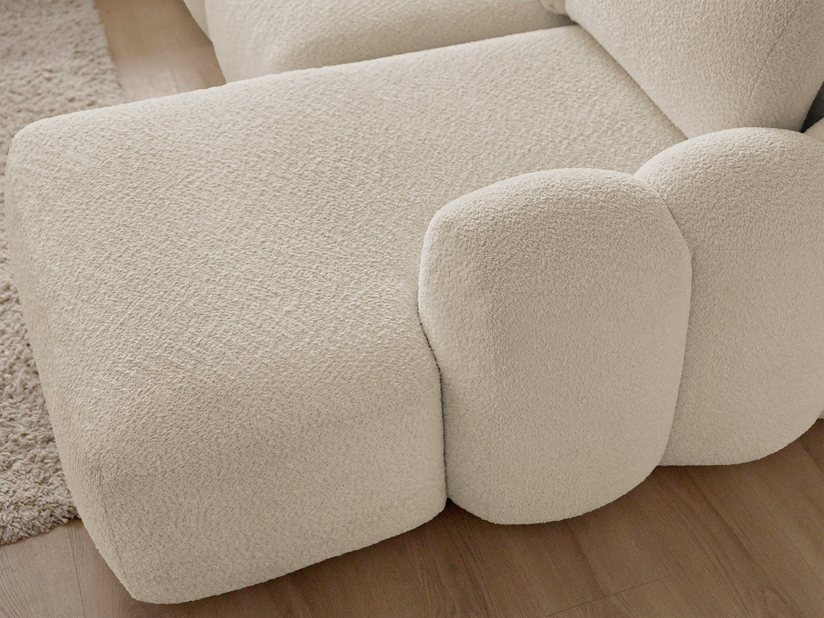 Canapé panoramique convertible coffre MONTAIGNE tissu bouclette avec pouf