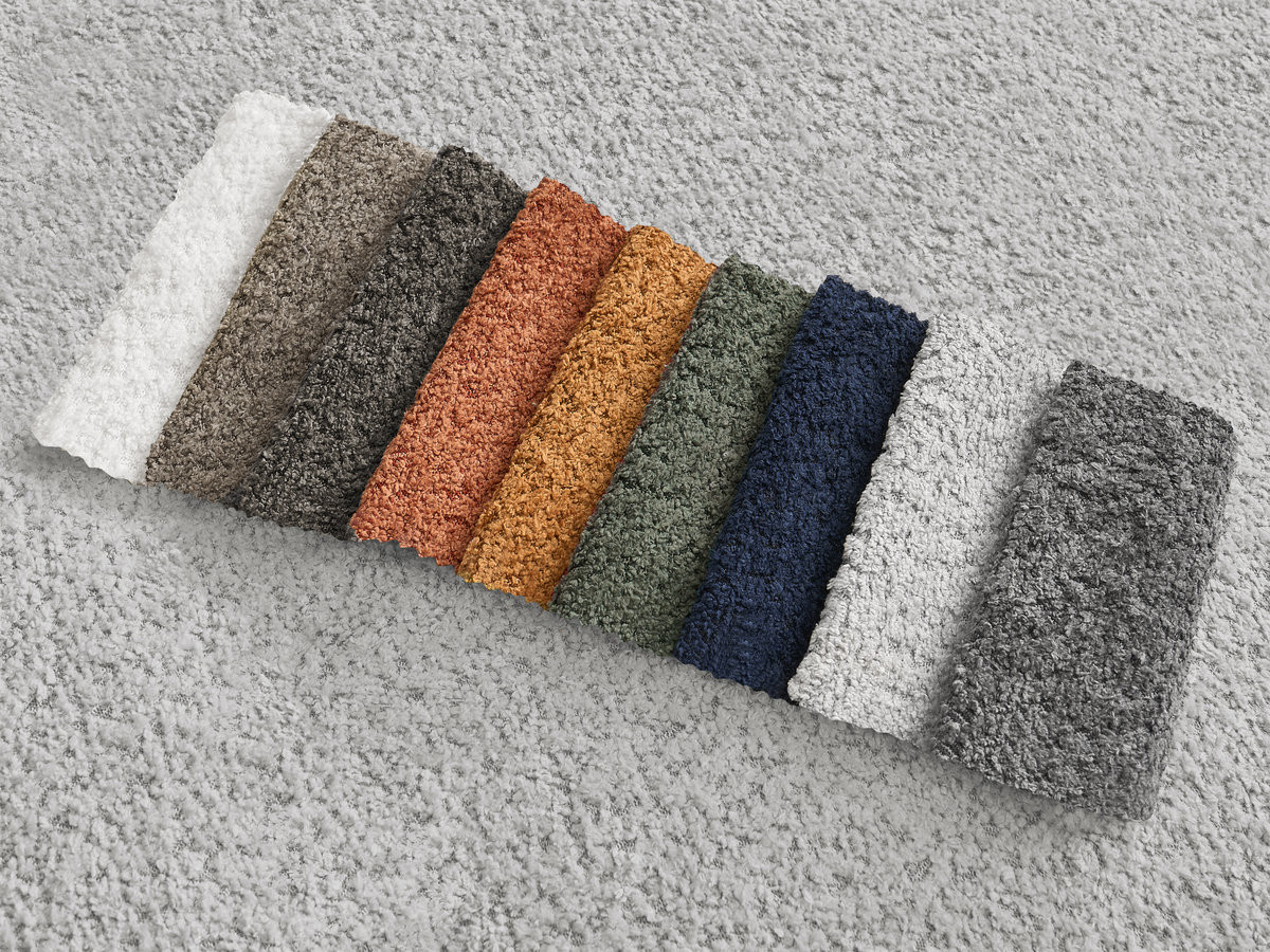 MONTAIGNE panoramische slaapbank met opbergruimte, bouclé stof en voetenbank.