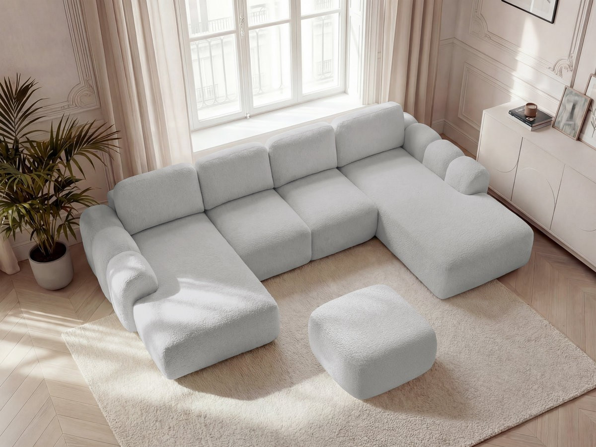 MONTAIGNE panoramische slaapbank met opbergruimte, bouclé stof en voetenbank.