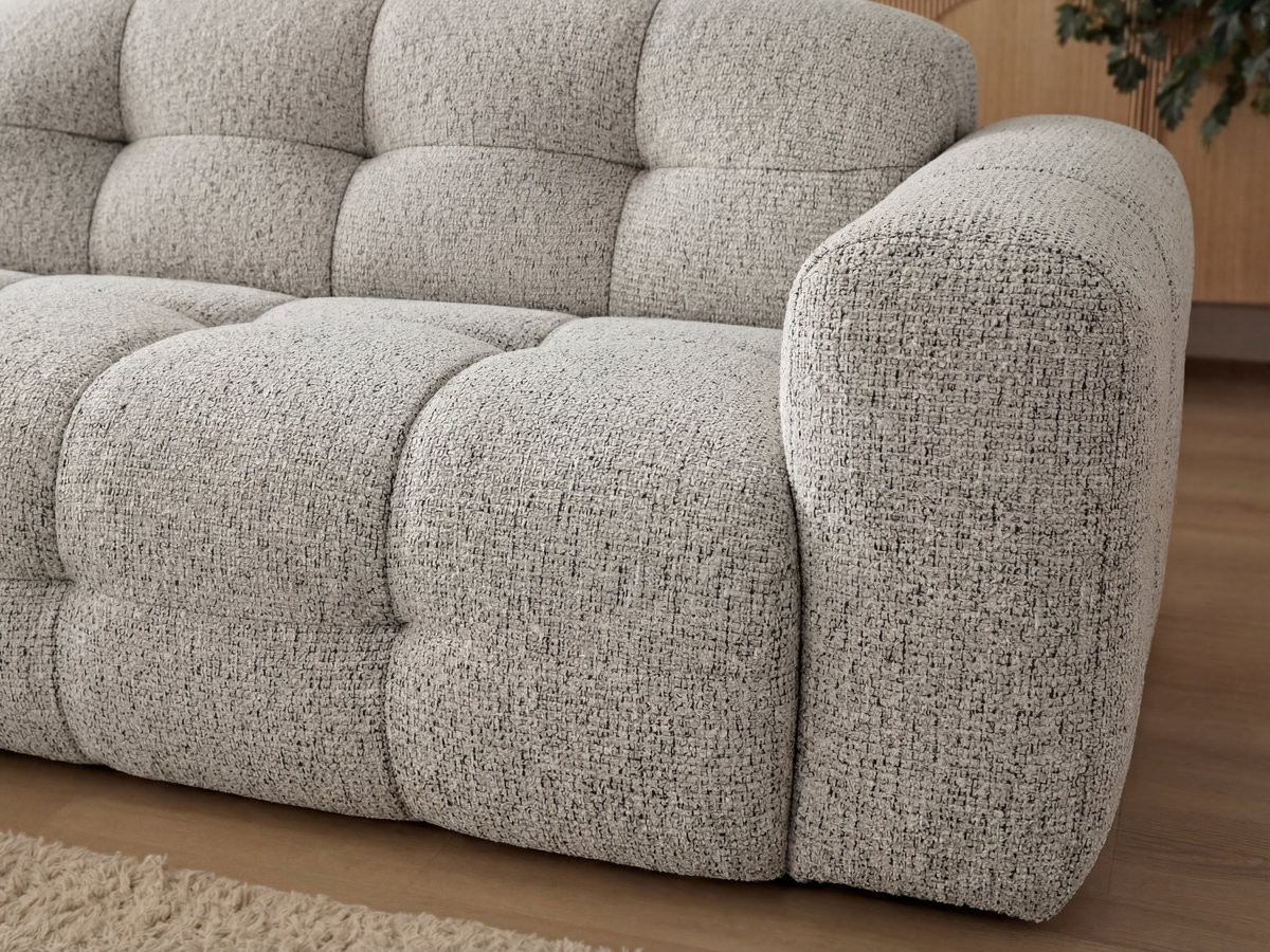 Canapé d'angle fixe LAURA tissu chiné avec grand pouf