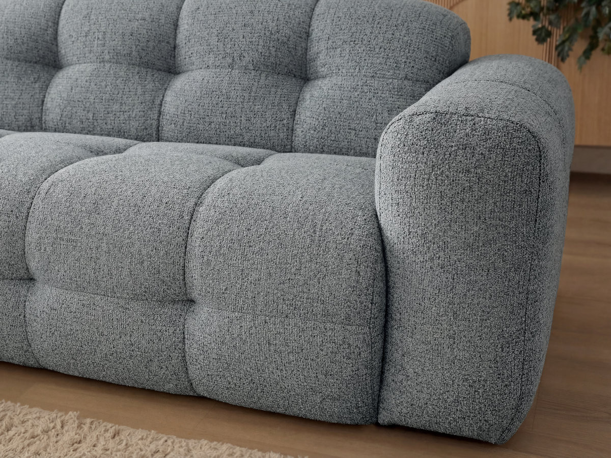 Canapé d'angle fixe LAURA tissu chiné avec grand pouf