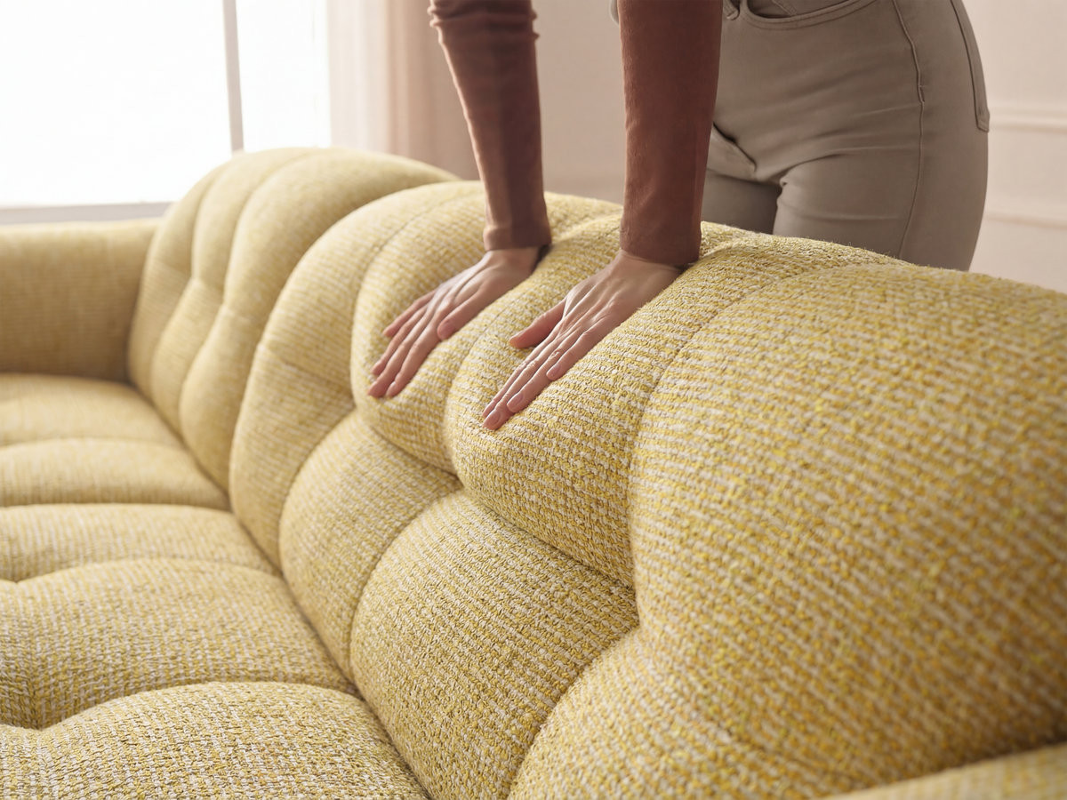 Canapé d'angle fixe LAURA tissu chiné avec grand pouf