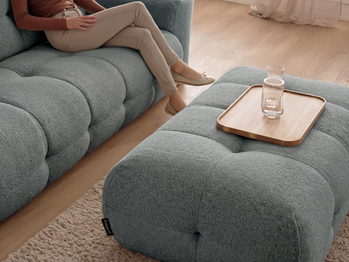 Canapé d'angle fixe LAURA tissu chiné avec grand pouf