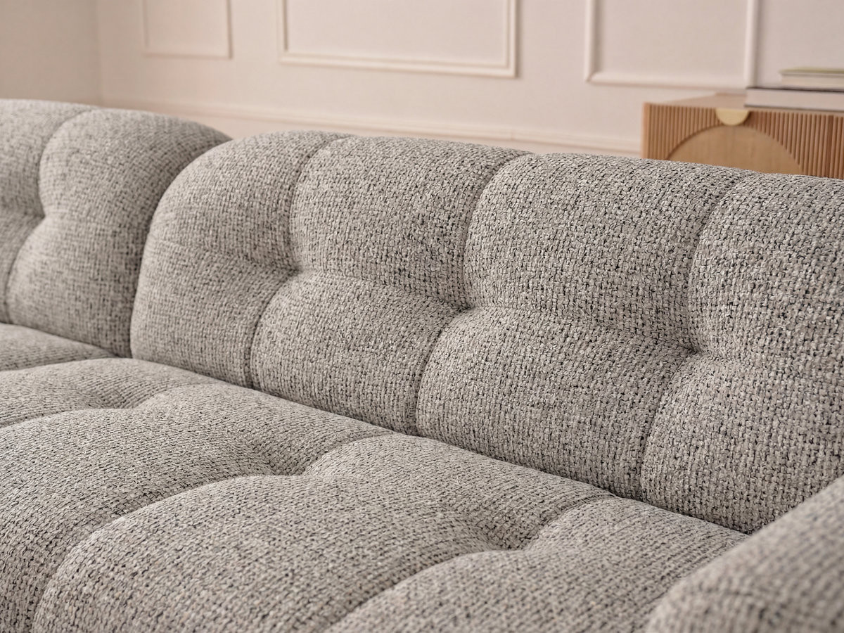 Canapé d'angle fixe LAURA tissu chiné avec grand pouf