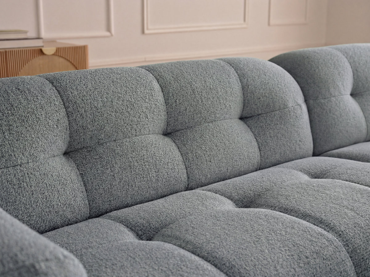 Canapé d'angle fixe LAURA tissu chiné avec grand pouf