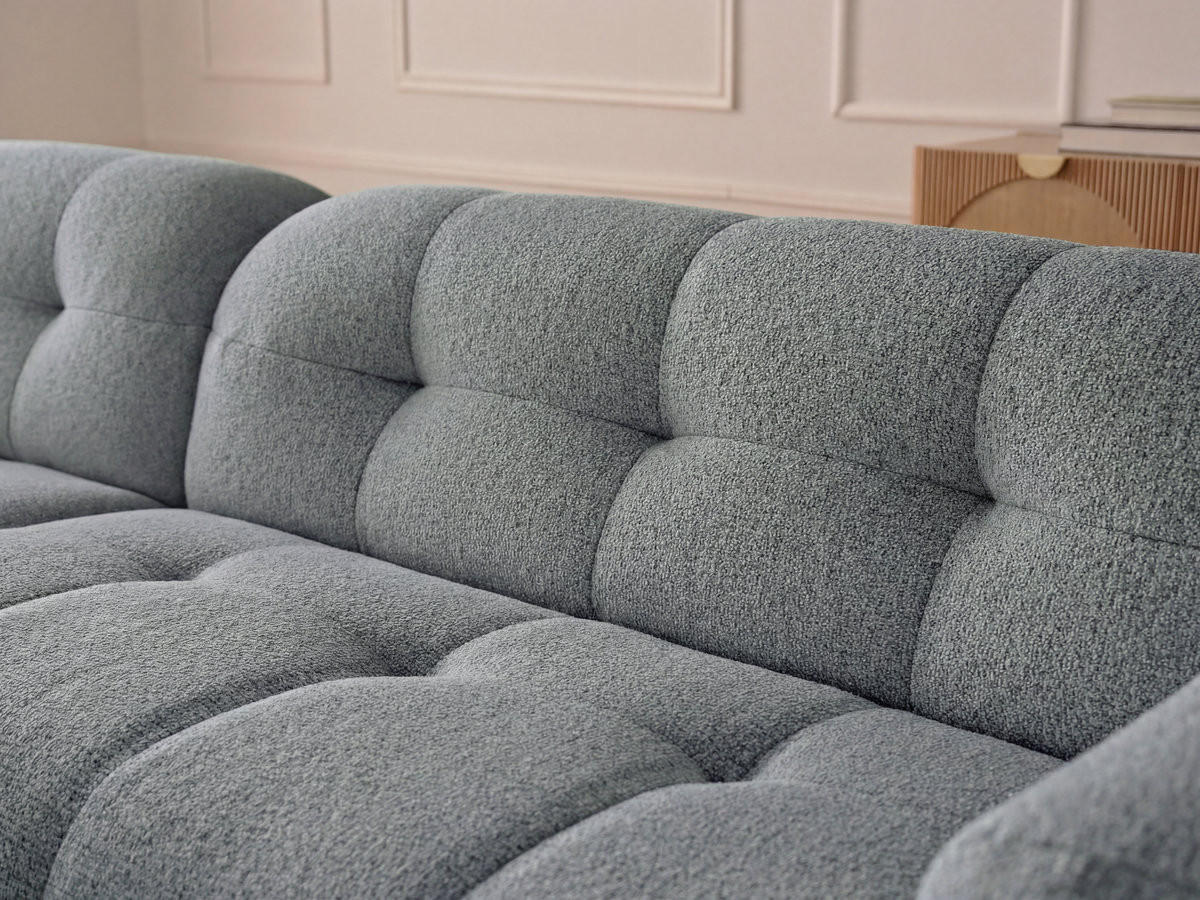 Canapé d'angle fixe LAURA tissu chiné avec grand pouf