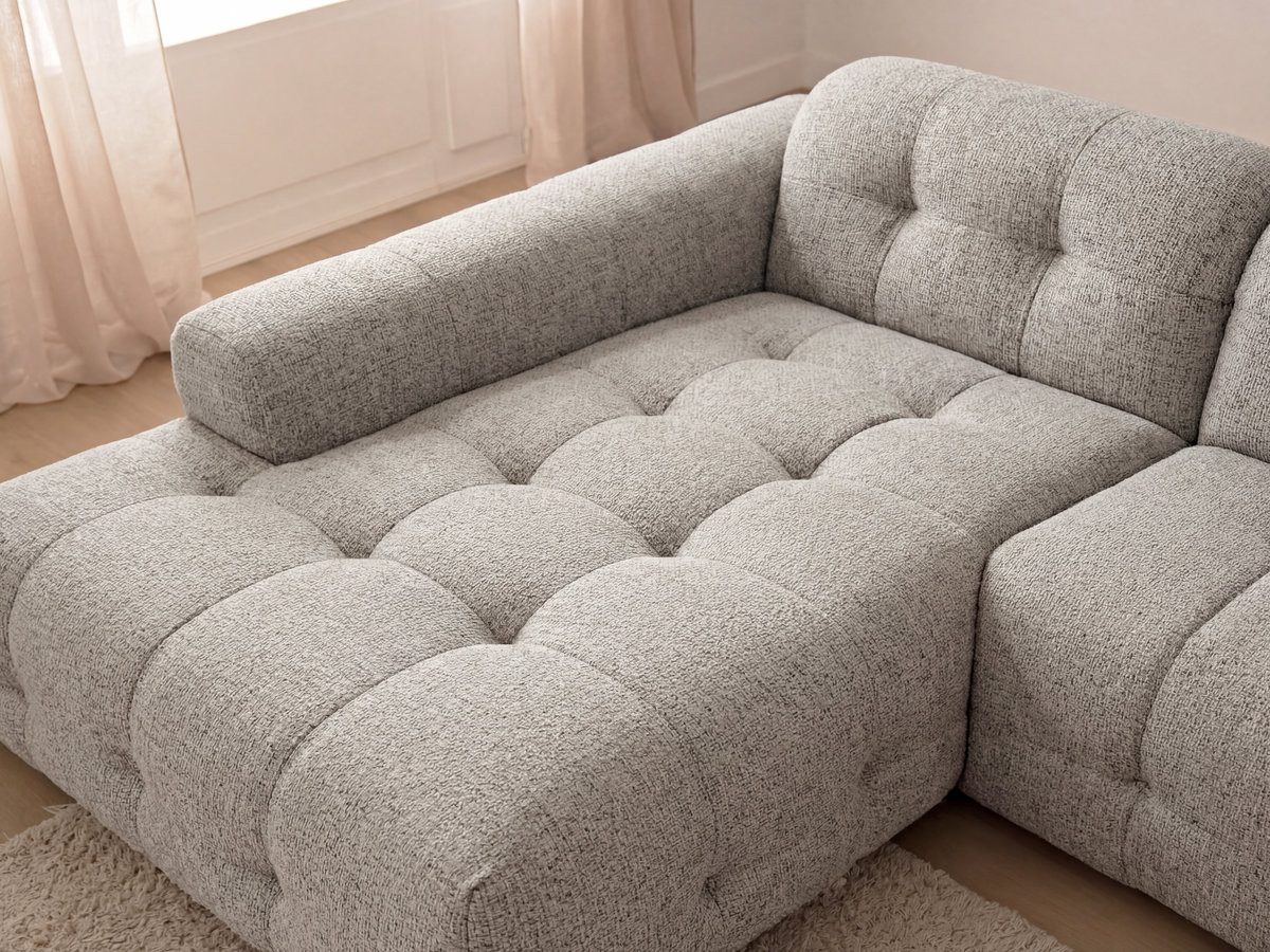 Canapé d'angle fixe LAURA tissu chiné avec grand pouf