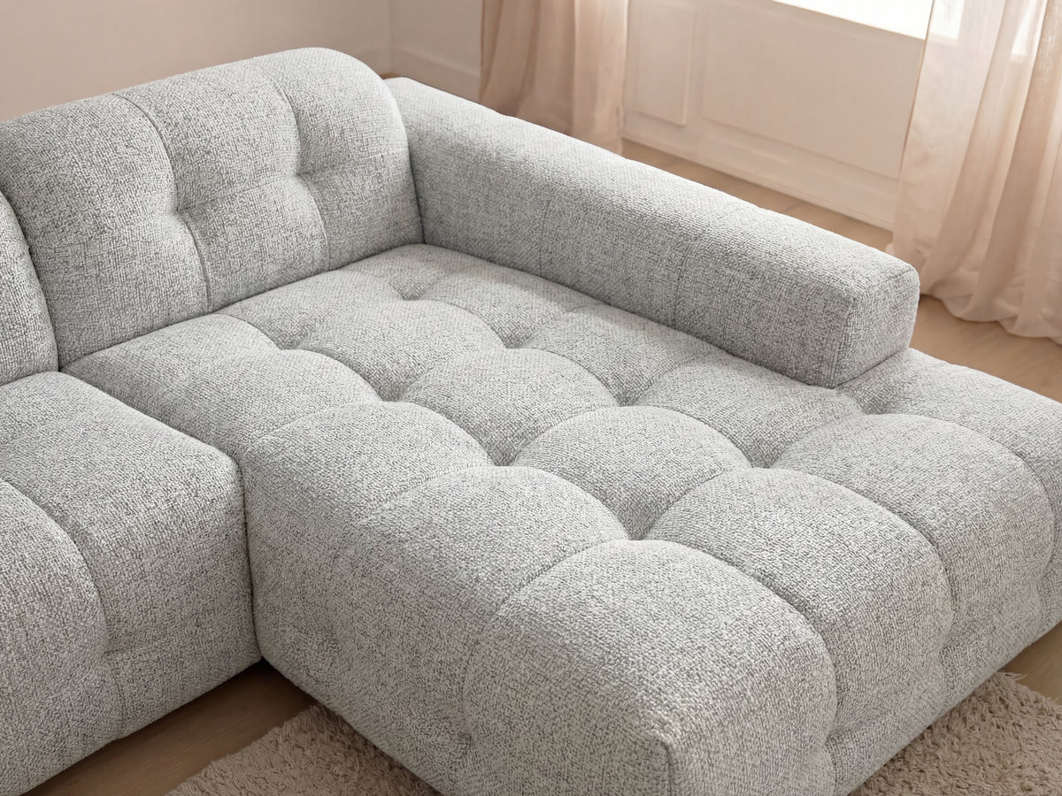 Canapé d'angle fixe LAURA tissu chiné avec grand pouf