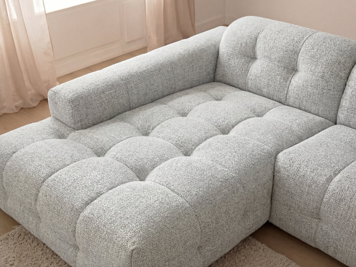 Canapé d'angle fixe LAURA tissu chiné avec grand pouf