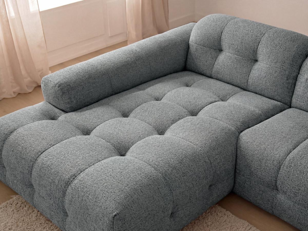 Canapé d'angle fixe LAURA tissu chiné avec grand pouf