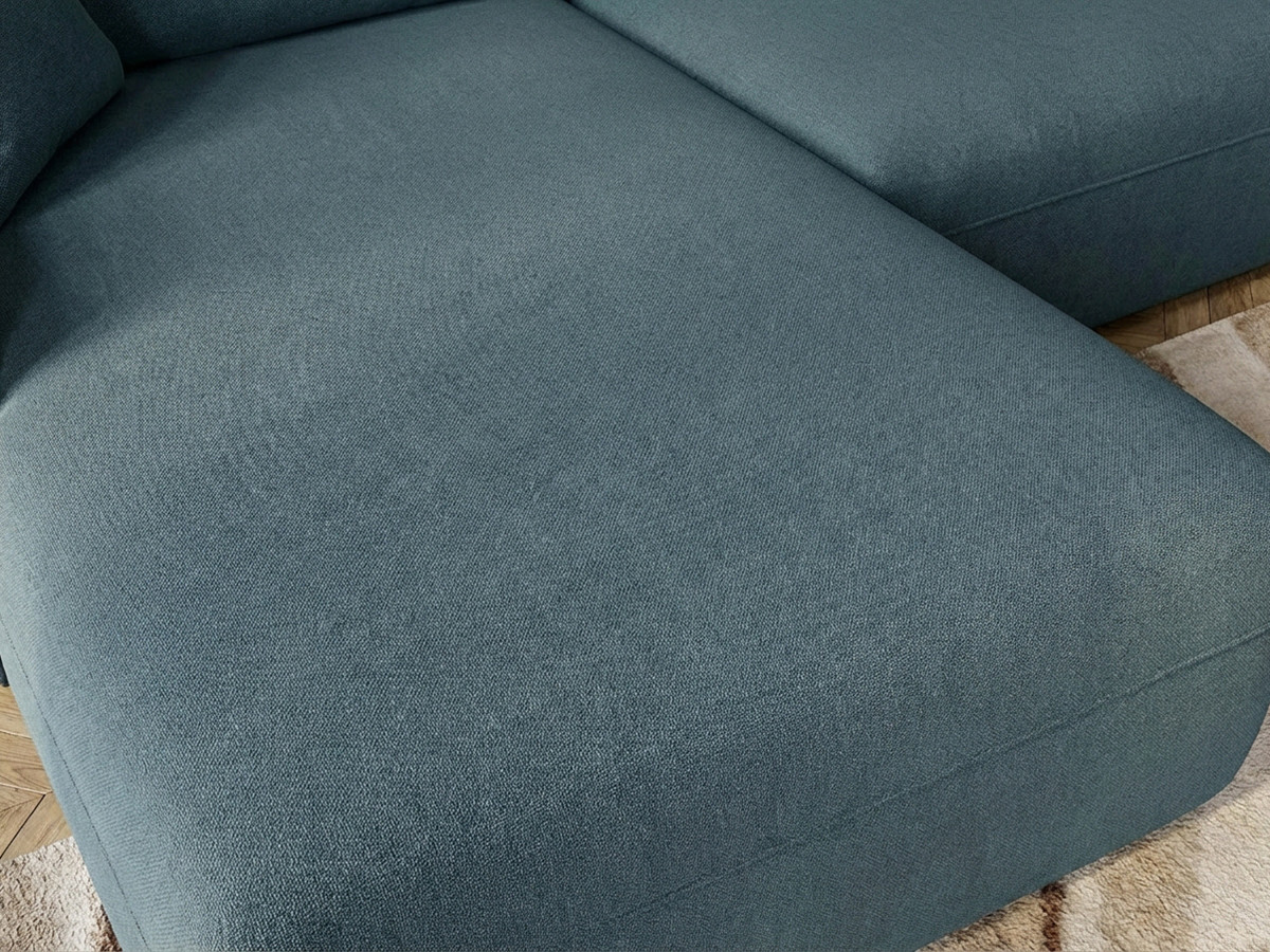 Canapé d'angle fixe LUIGI tissu lisse avec pouf