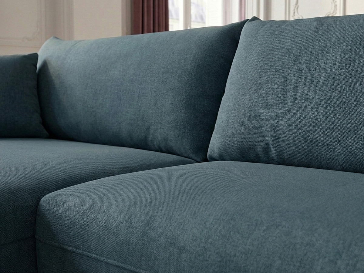 Canapé d'angle fixe LUIGI tissu lisse avec pouf