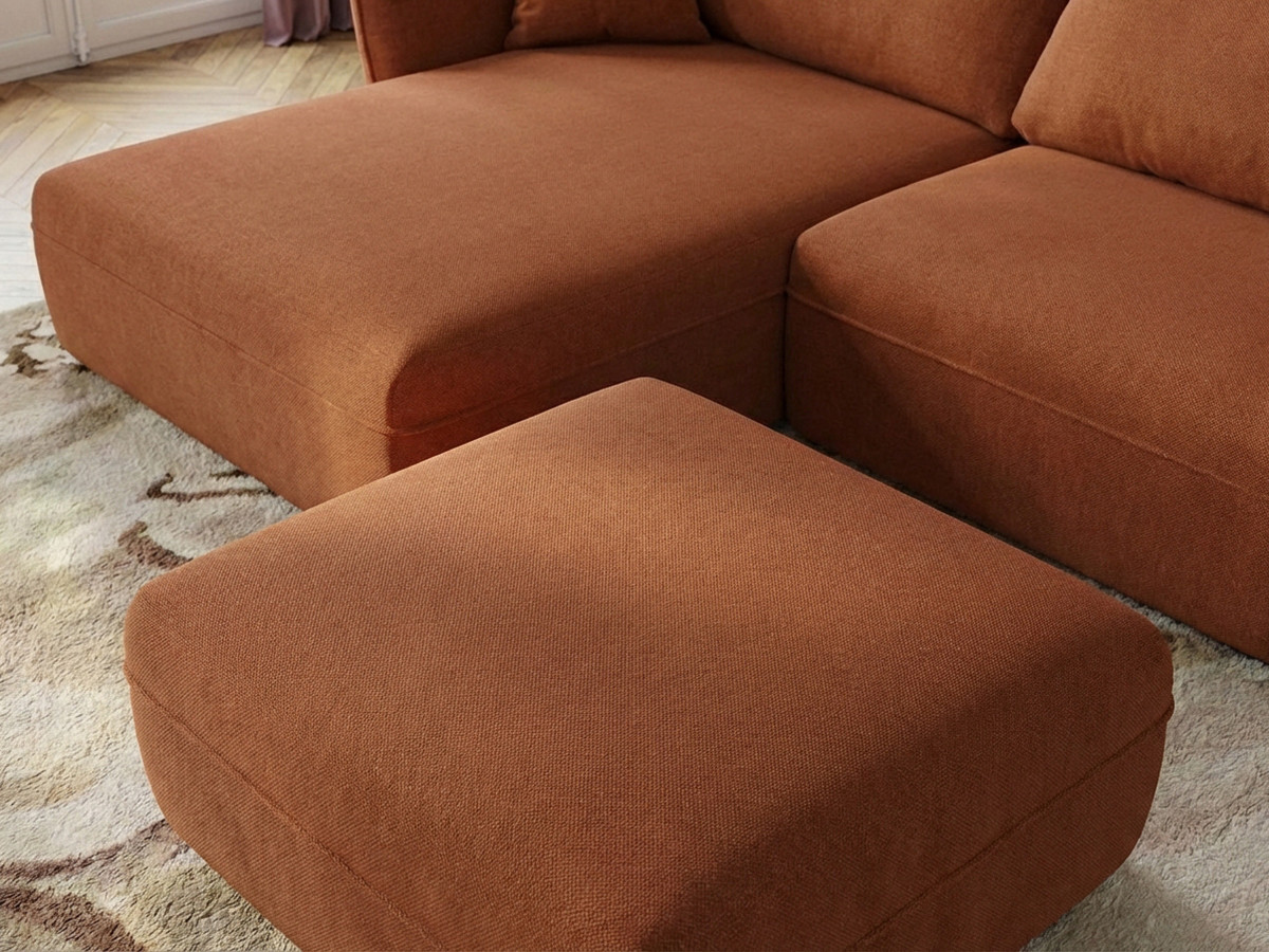 Canapé d'angle fixe LUIGI tissu lisse avec pouf