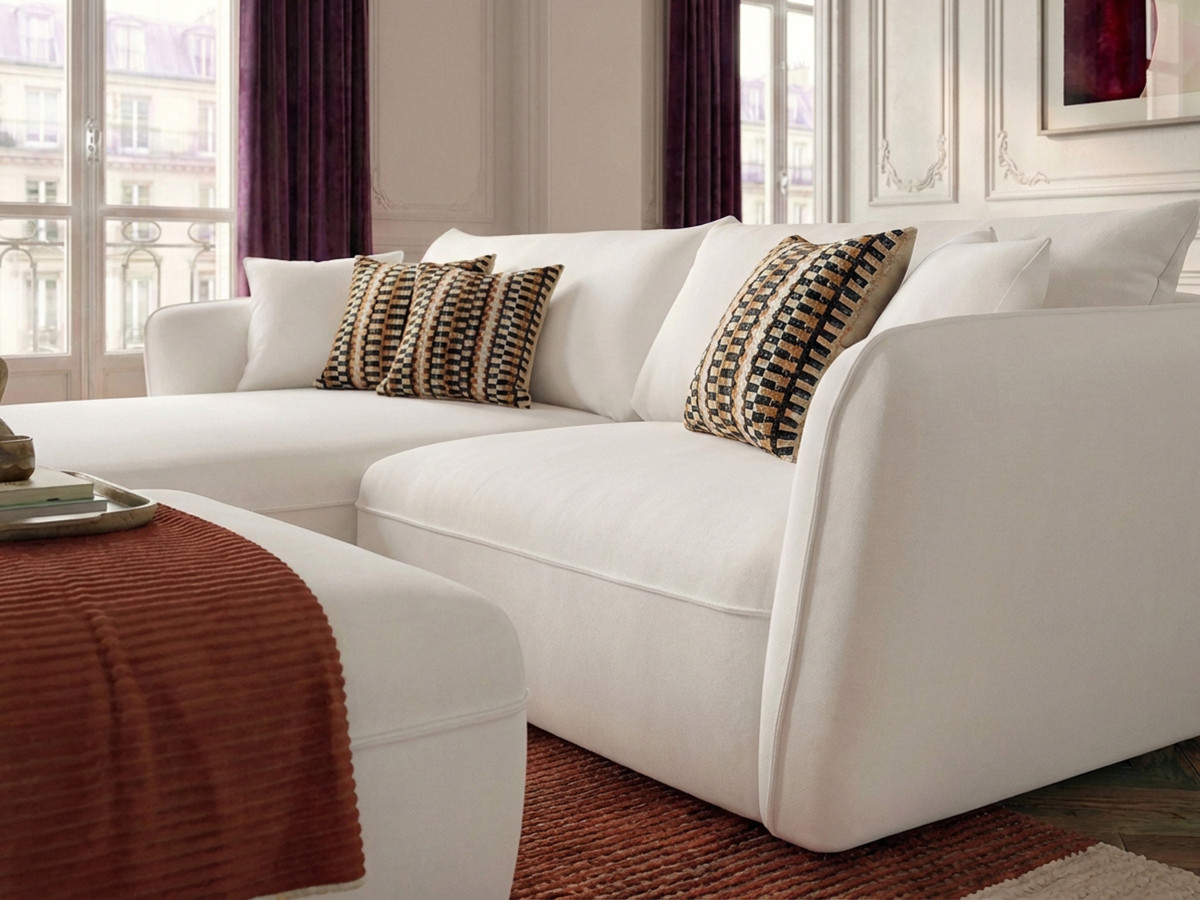 Canapé d'angle fixe LUIGI tissu lisse avec pouf