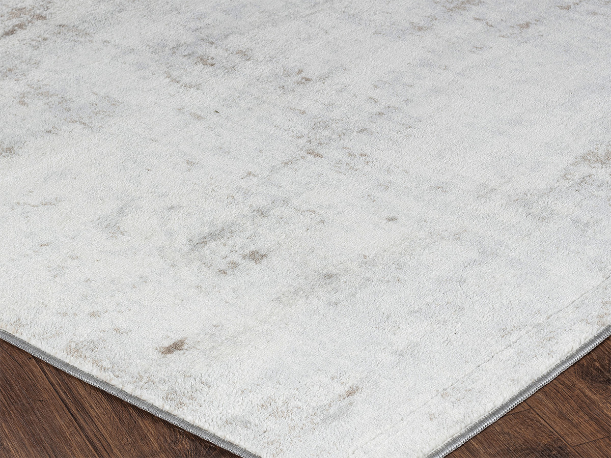 Tapis poils ras NOLWEN motif abstrait