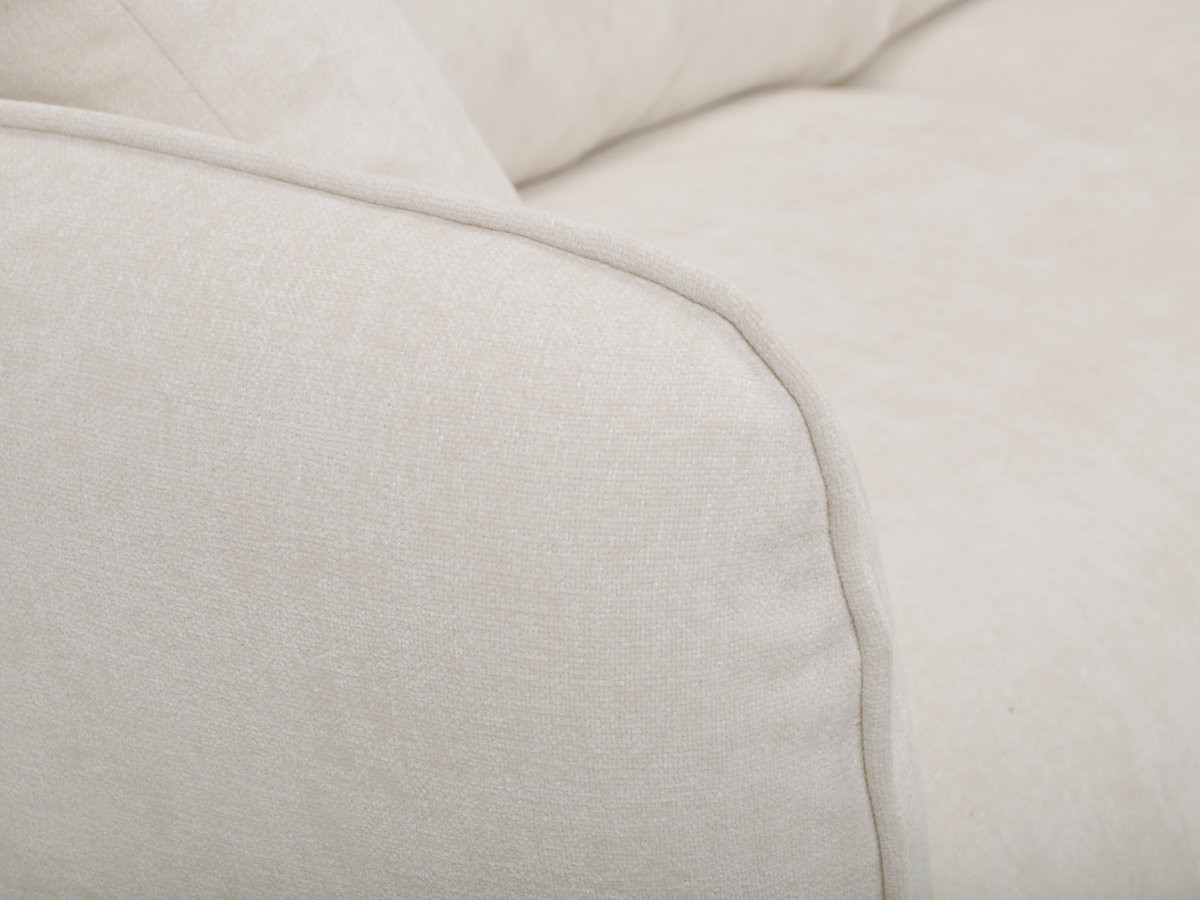 Canapé d'angle fixe LUIGI tissu lisse avec pouf