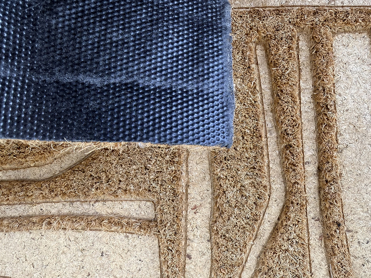 TALM deurmat met grafische patronen