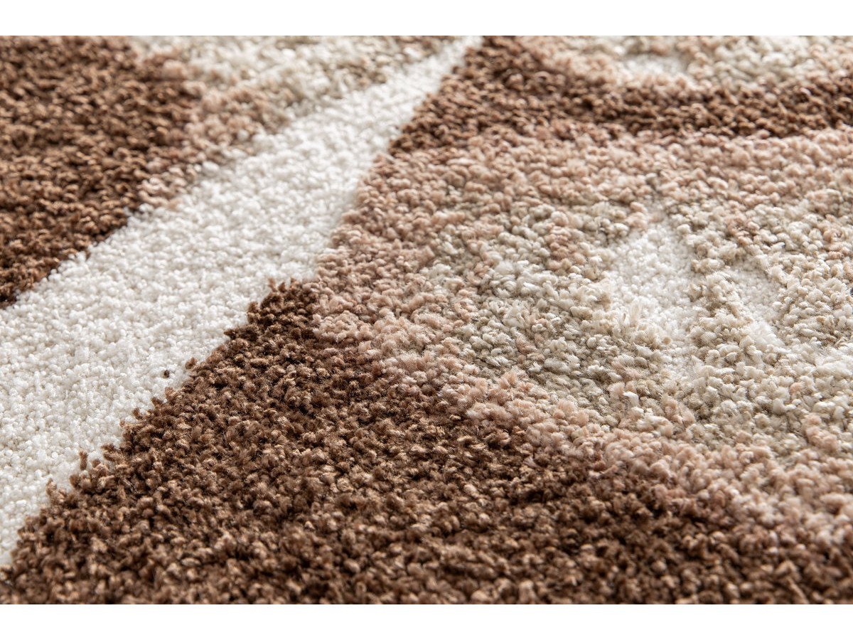 Tapis rond poils longs MOCCA motif abstrait