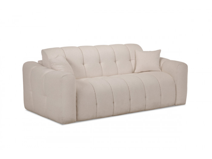 Canapé Bradley en tissu beige clair vu de profil, dossier quilté et accoudoirs.