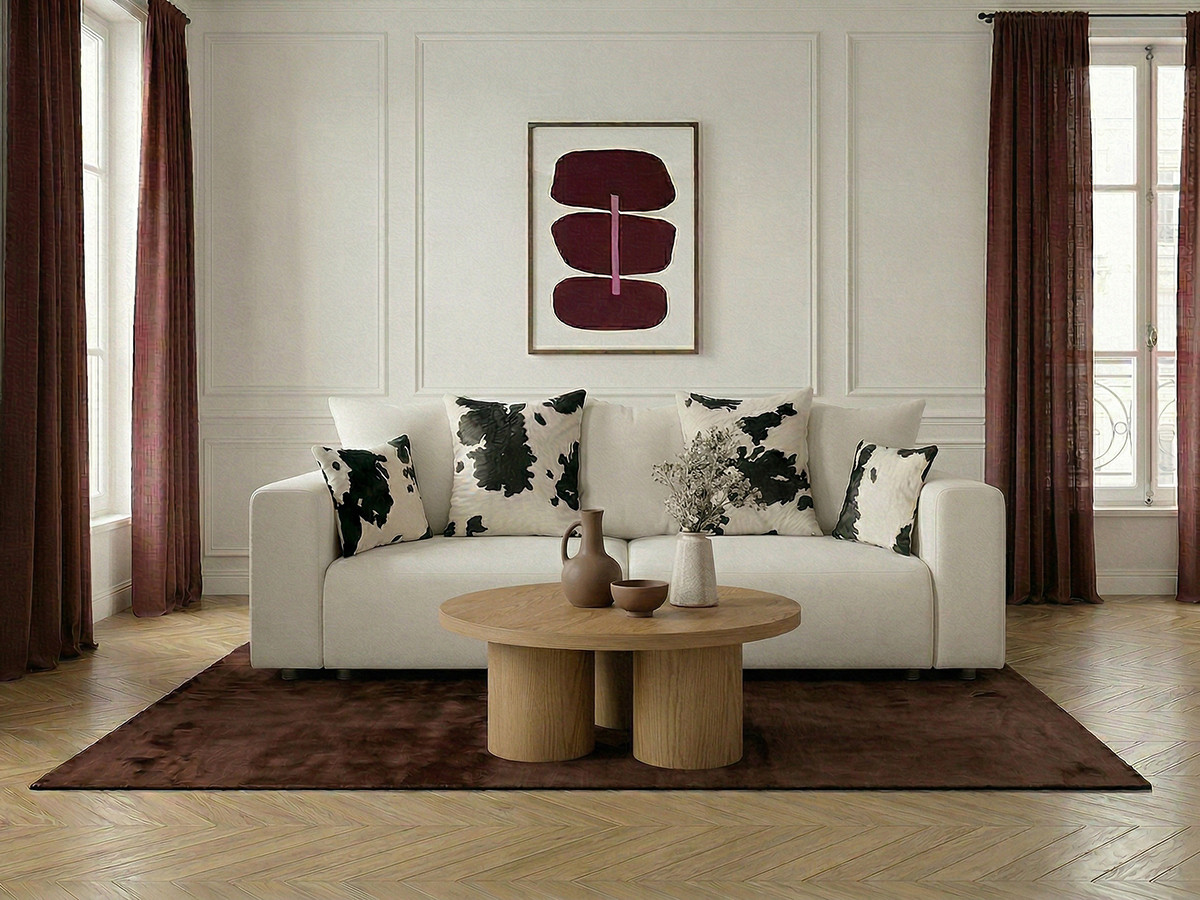 Canapé droit convertible SIDONIE avec coussins à motif vache