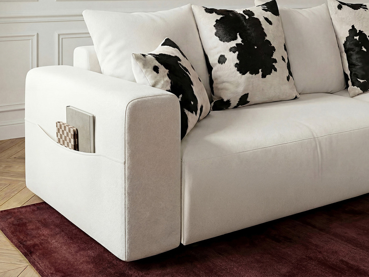 Canapé d'angle convertible réversible coffre SIDONIE avec coussins à motif vache