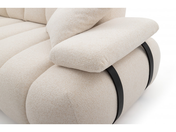 Détail des arcs noirs métalliques et du tissu beige épais du Canapé Rivoli.
