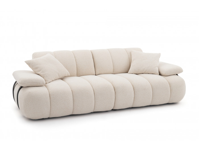 Canapé Rivoli beige clair vu de trois quarts avec coussins de dossier amovibles.