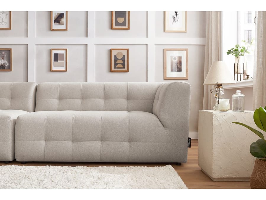 Canapé Kleber beige modulable deux modules, vu de côté montrant forme et profondeur du meuble.