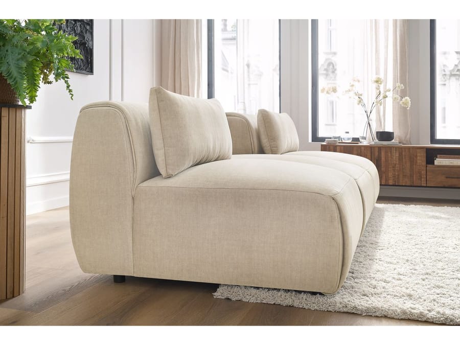 Canapé Jeanne modules beige vus de trois quarts, hauteur accoudoir visible