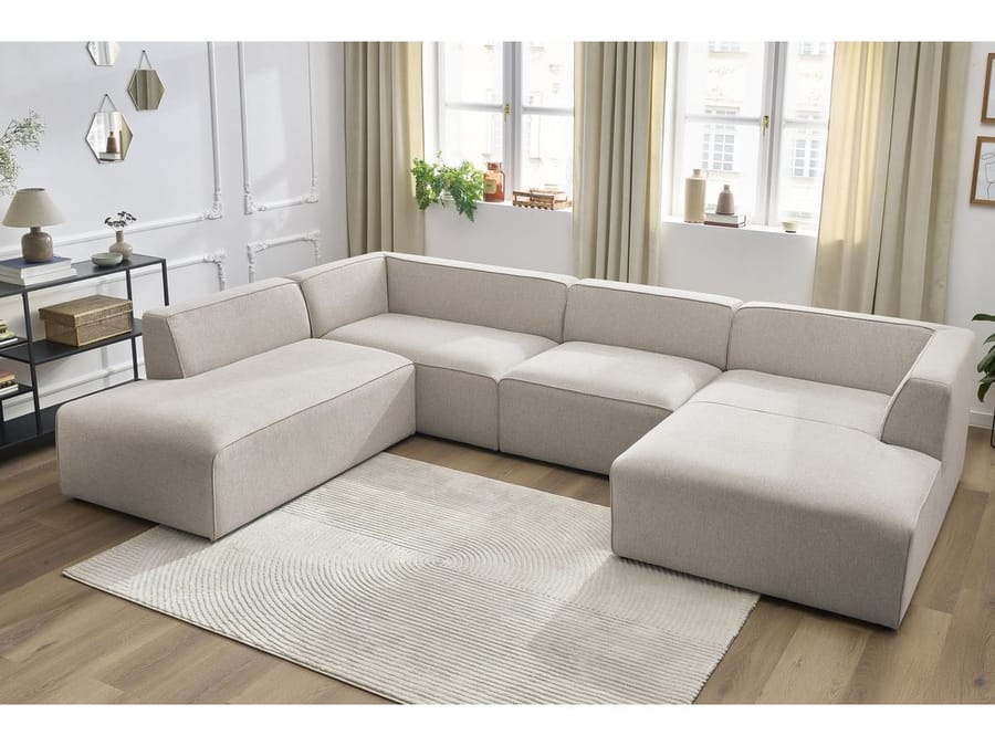 Canapé Megève angle méridienne à gauche en tissu beige dans un salon clair