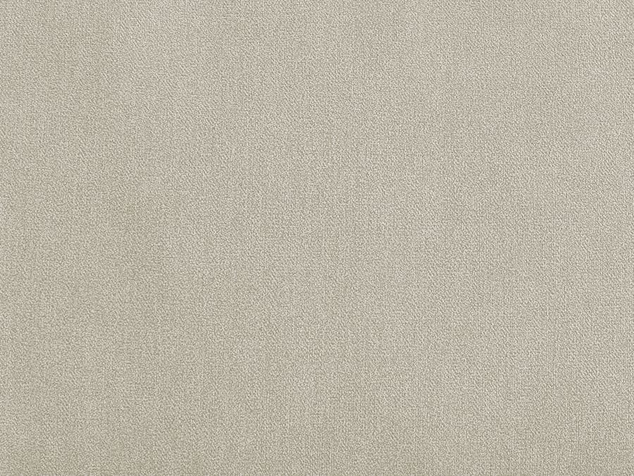 Gros plan du tissu beige du canapé Lenny montrant la texture de la matière.
