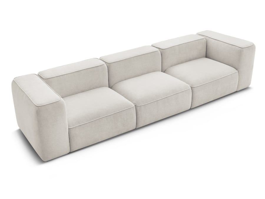 Canapé Zephyr modulable en tissu beige clair en configuration trois modules, vue d'ensemble.