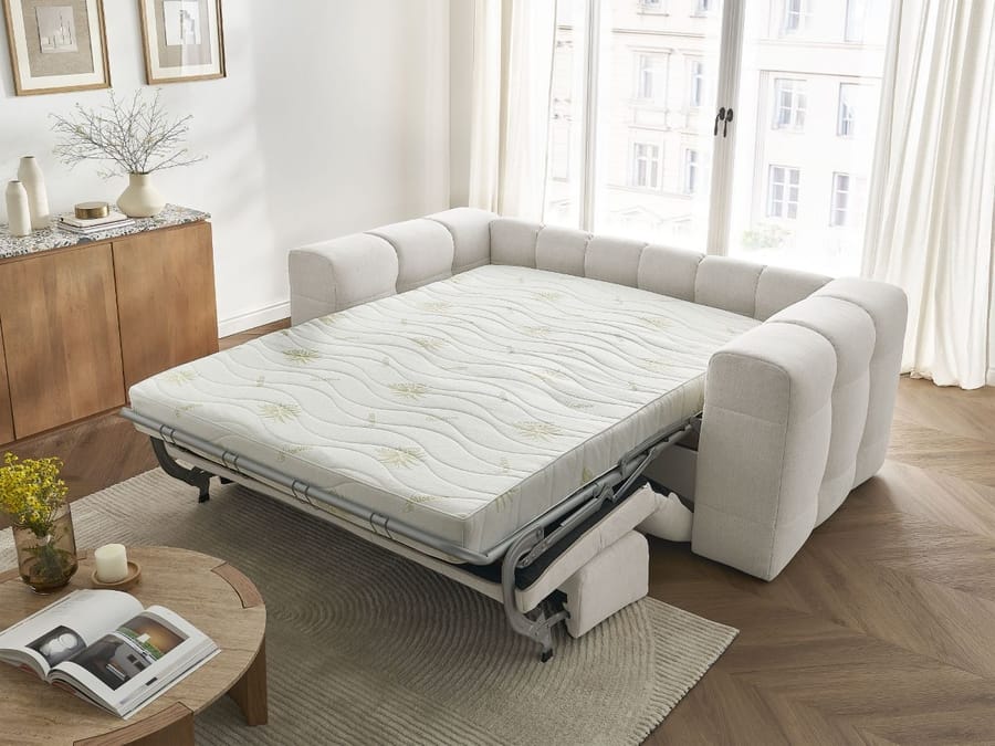 Canapé Cloud convertible lit beige transformé en lit avec matelas blanc vue de trois quarts