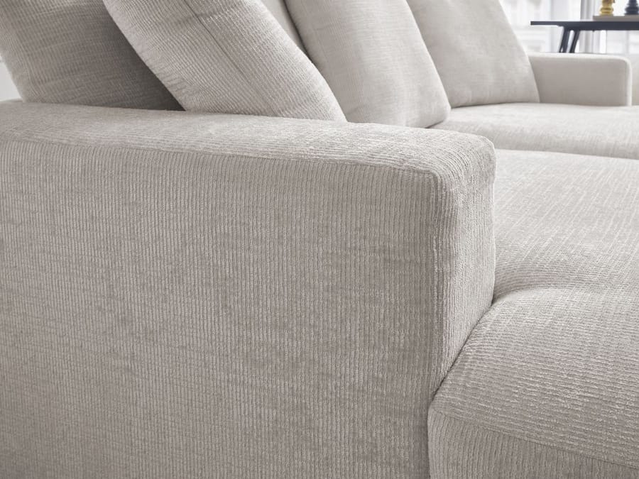 Gros plan matière canapé Siméon en tissu gris montrant la texture tissée