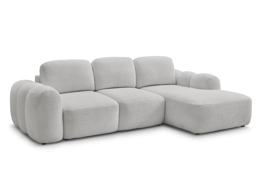 Canapé Montaigne en tissu blanc crème, configuration angle, vue de profil trois-quarts