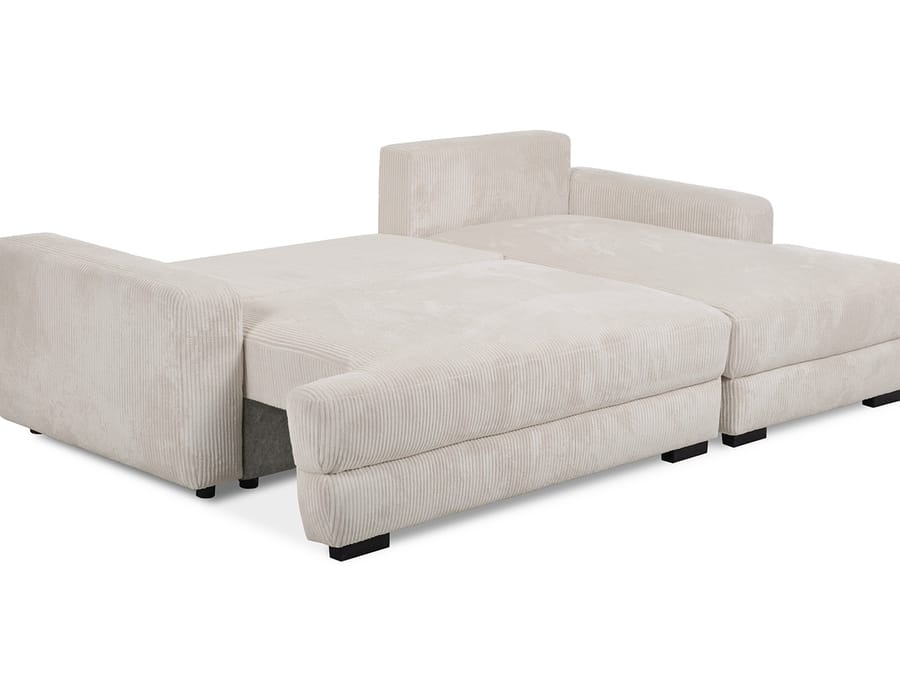 Canapé Campi convertible déplie en lit matelas visible, tissu beige côtelé.