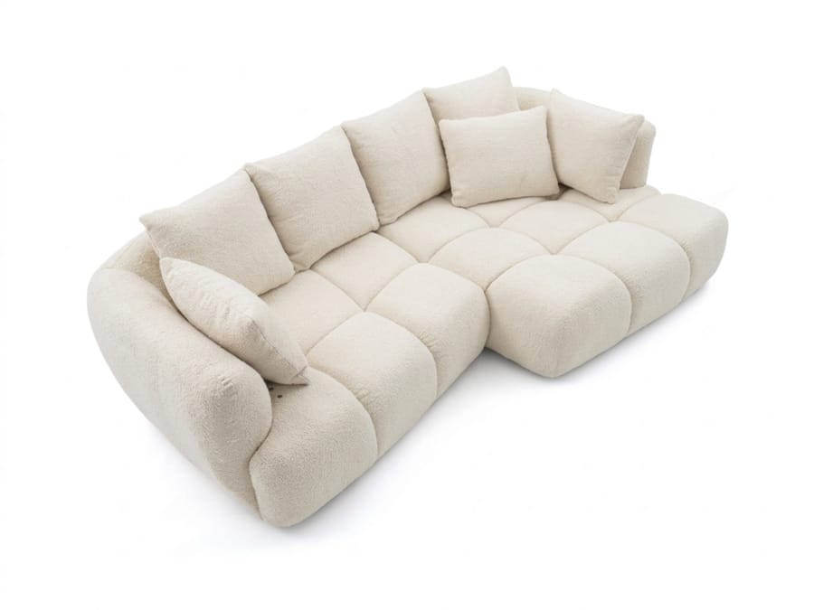 Canapé d'angle Aude beige, détail vue trois quarts des coussins et de l'assise.