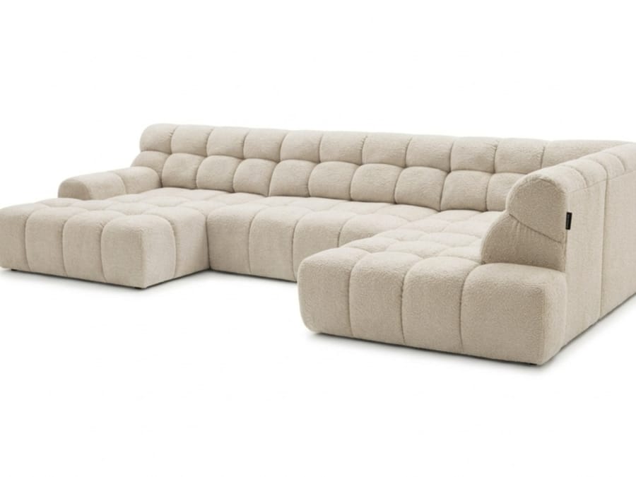 Canapé André angle beige vu de trois quarts montrant modules et forme générale