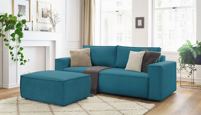 Canap&eacute; 2 places avec un pouf d'angle